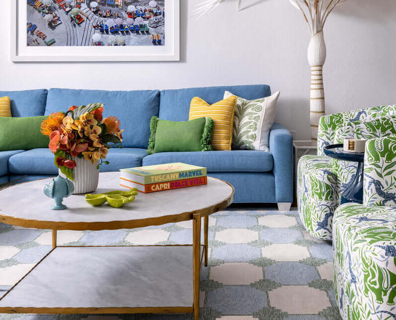 Colourful home with canvas palm tree pattern colourful blue green and jute rug overlooking ocean