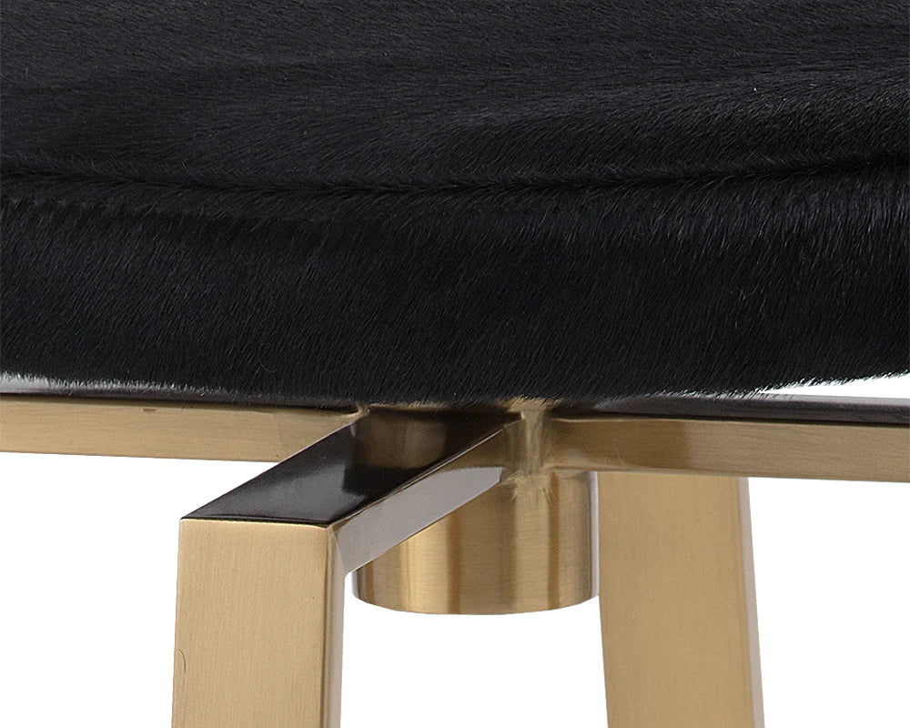 Counter stool with pony hair black top and brass base swivel contemporary design