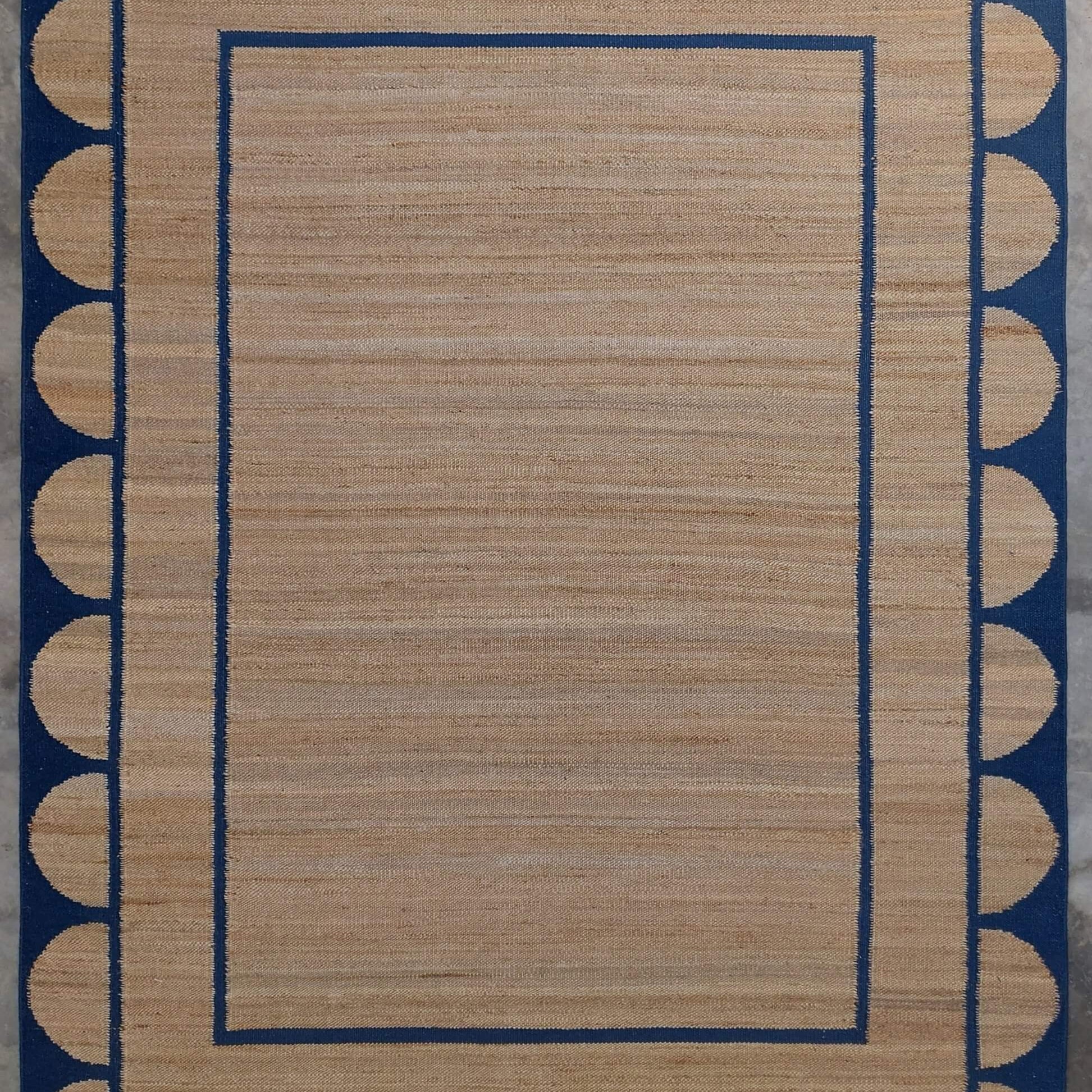 Scalloped edge jute rug in blue From Jaipur with Love