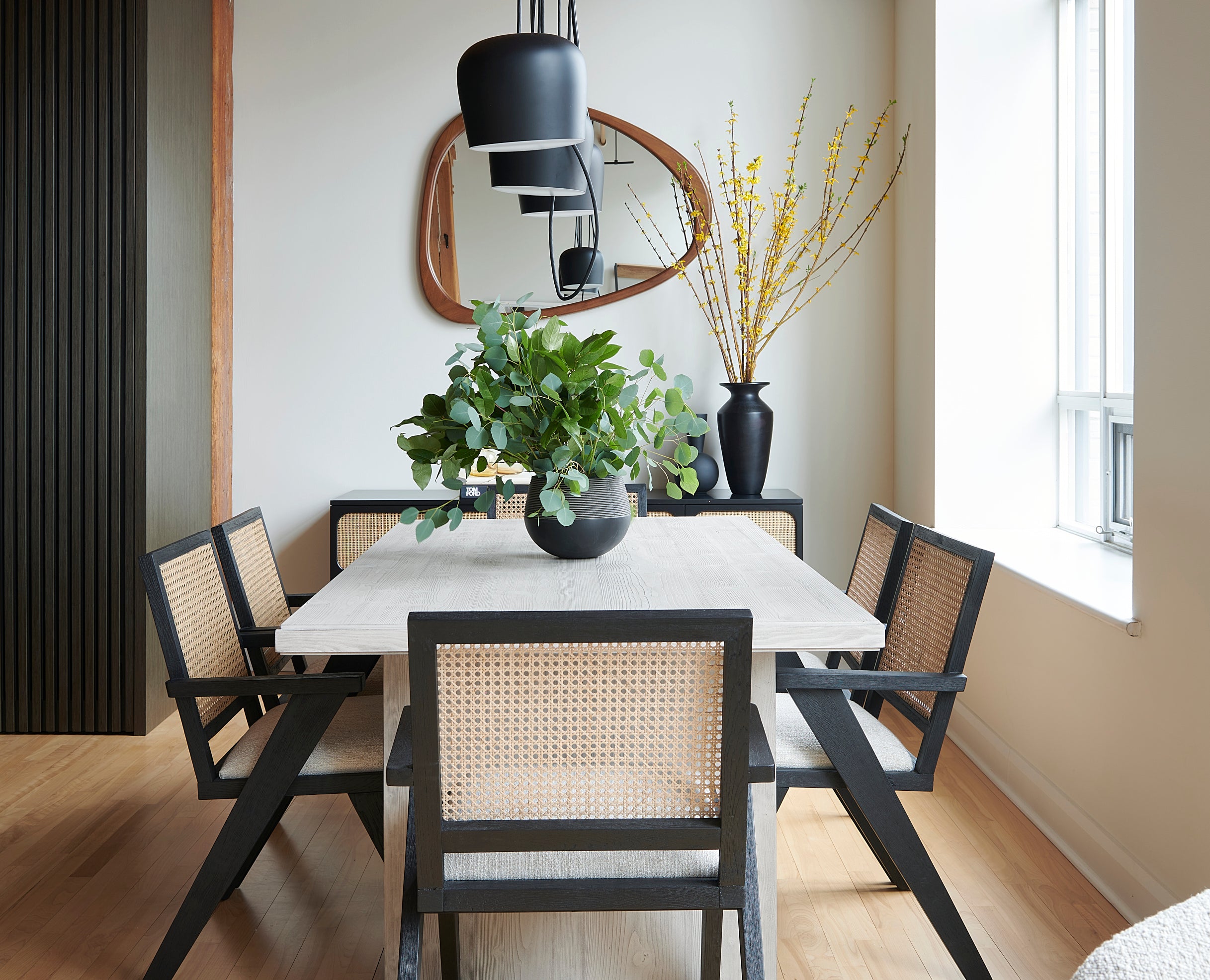 dining room, contemporary dining room, cane dining room chairs, black fixtures, oak furniture