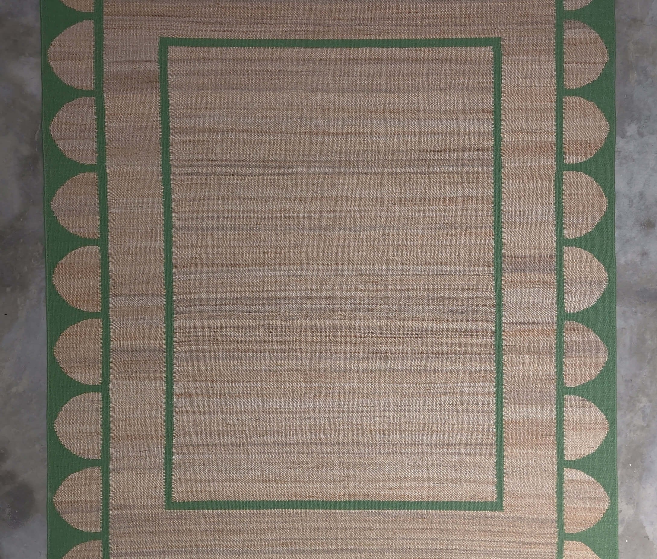 Scalloped edge jute rug in green From Jaipur with Love