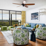Colourful home with canvas palm tree pattern colourful blue green and jute rug overlooking ocean