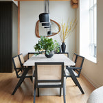 dining room, contemporary dining room, cane dining room chairs, black fixtures, oak furniture