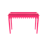 Bright pink lacquer console with scalloped edger foyer entry