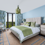 Naples Florida bedroom with blue and green Mattock scallop bedding and jute rug with scallop edge