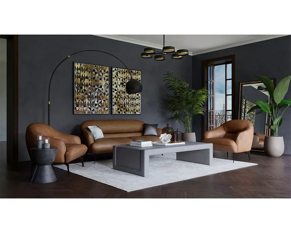 Cognac leather sofa and arm chairs mid-century modern design with black painted walls