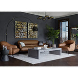 Cognac leather sofa and arm chairs mid-century modern design with black painted walls