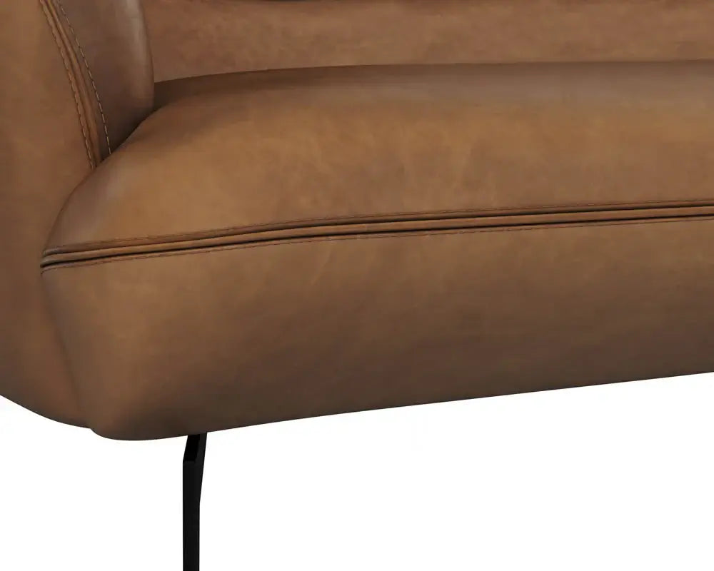 Cognac Italian leather sofa with black metal legs