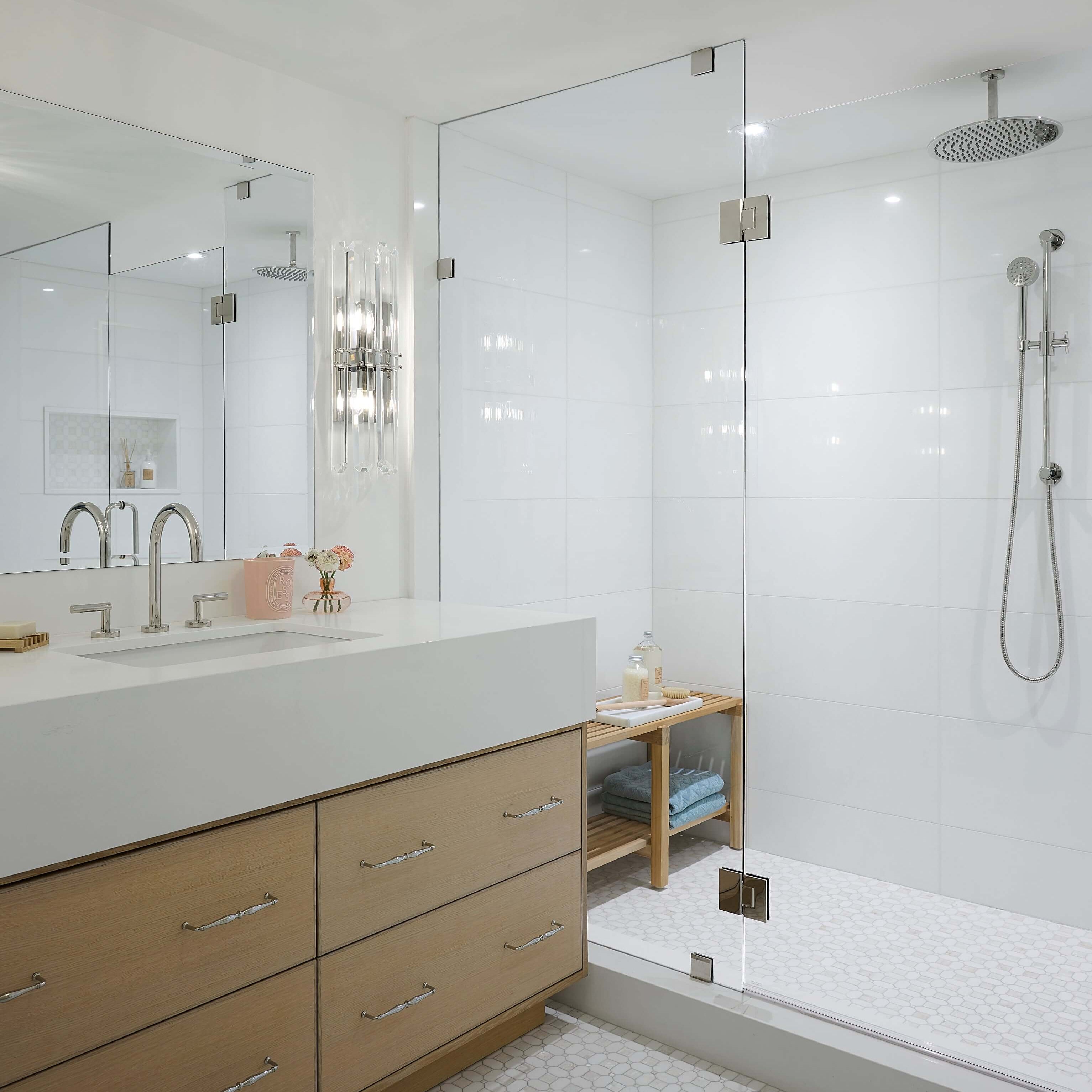 Sophisticated bathroom with rose Dyptique candle